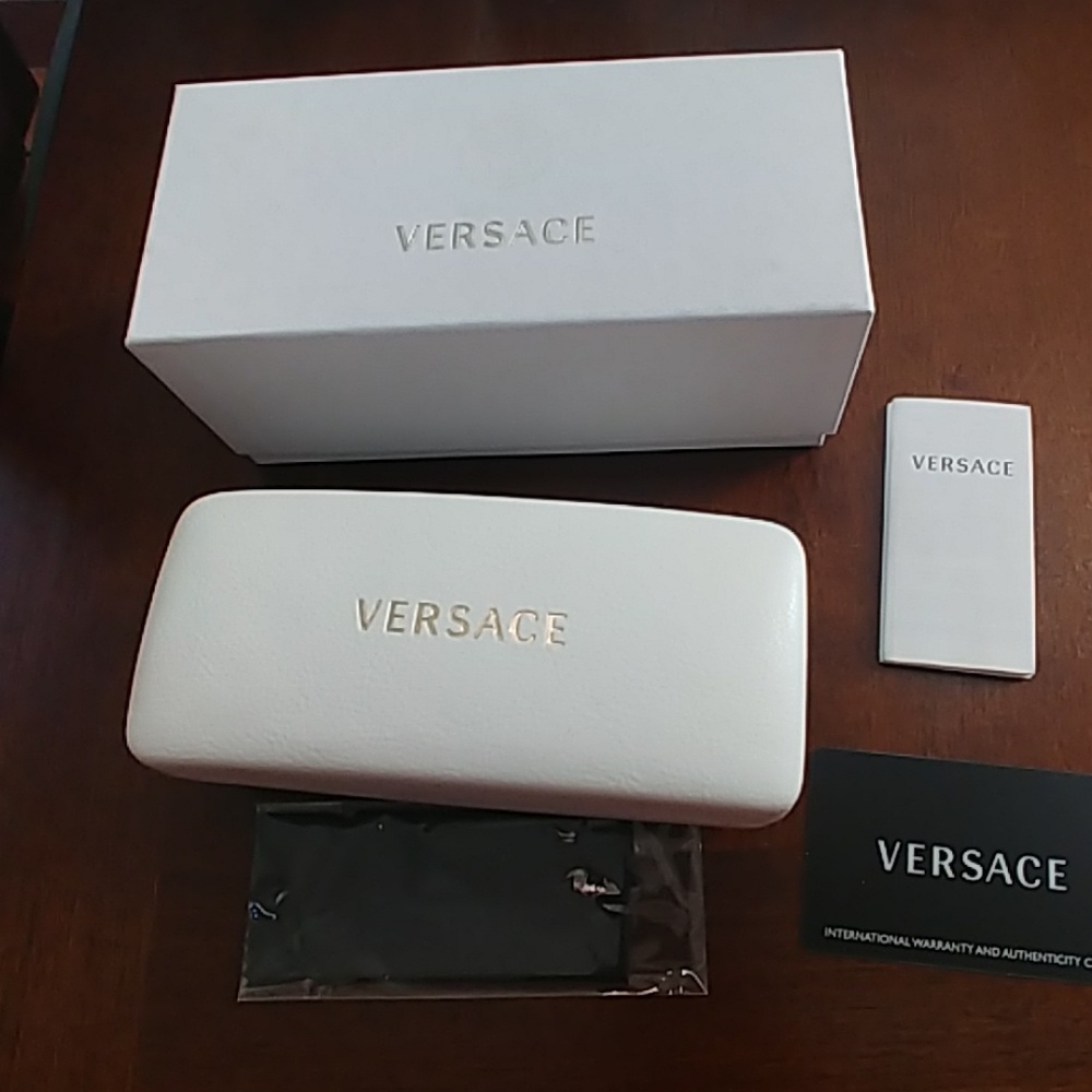 New versace sunglass case.